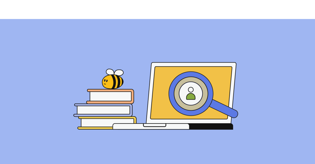 portátil y pila de libros